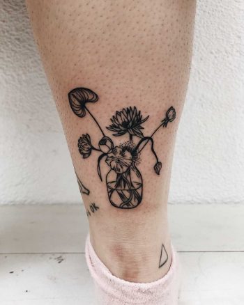 Flowers in a jug tattoo