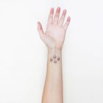 Four squares tattoo by Taylor Kaclik