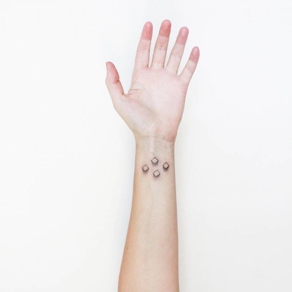 Four squares tattoo by Taylor Kaclik