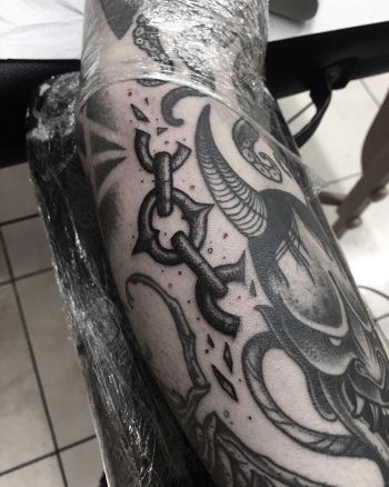 Freehand chain filler tattoo