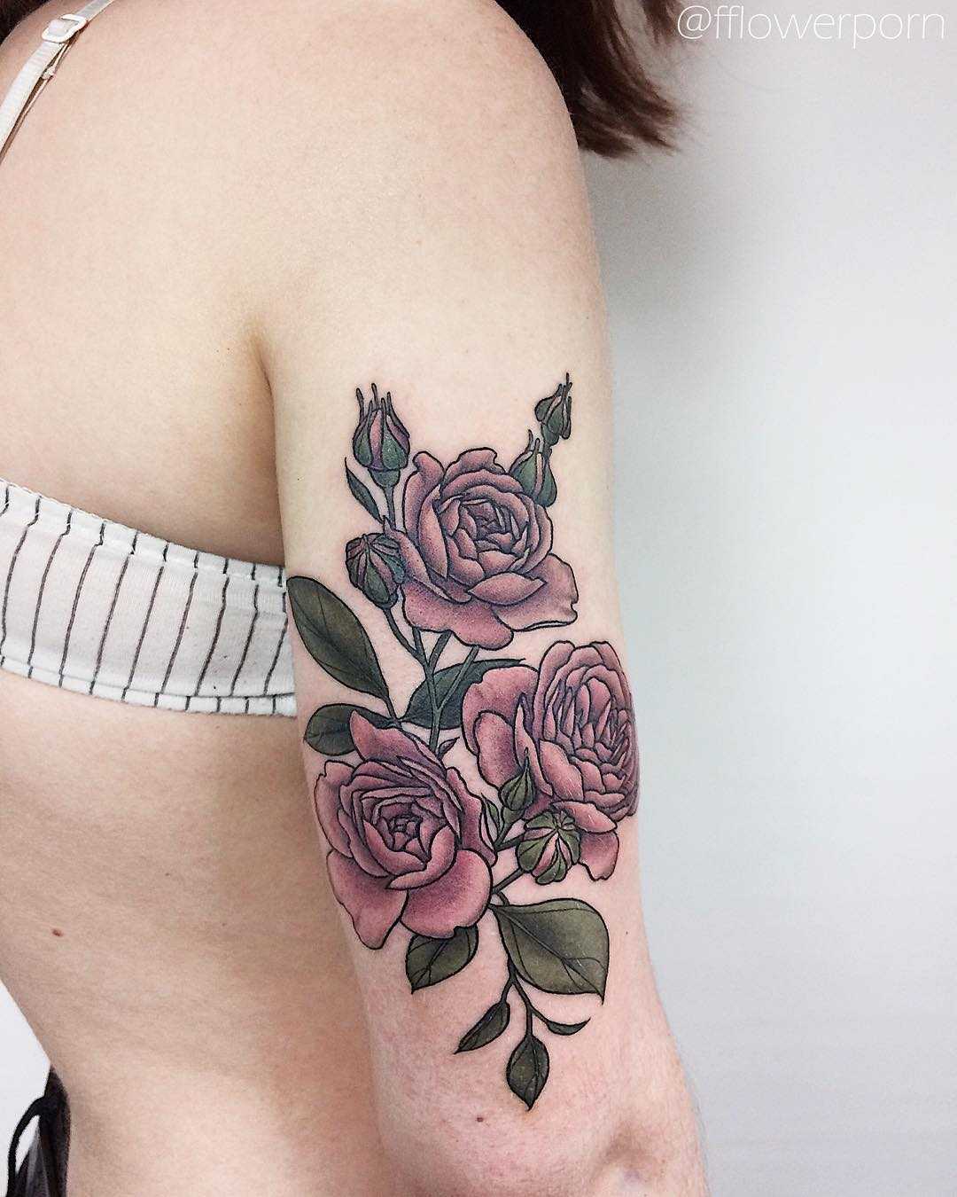 Garden roses tattoo on the arm