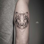 Geometric tiger tattoo by Mark Ostein