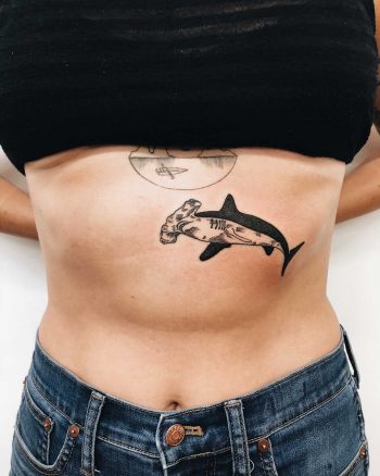 Hammerhead shark tattoo on the belly