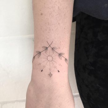 Hand-poked bracelet by Femme Fatale Tattoo