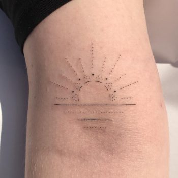 Hand-poked sunset by Femme Fatale Tattoo