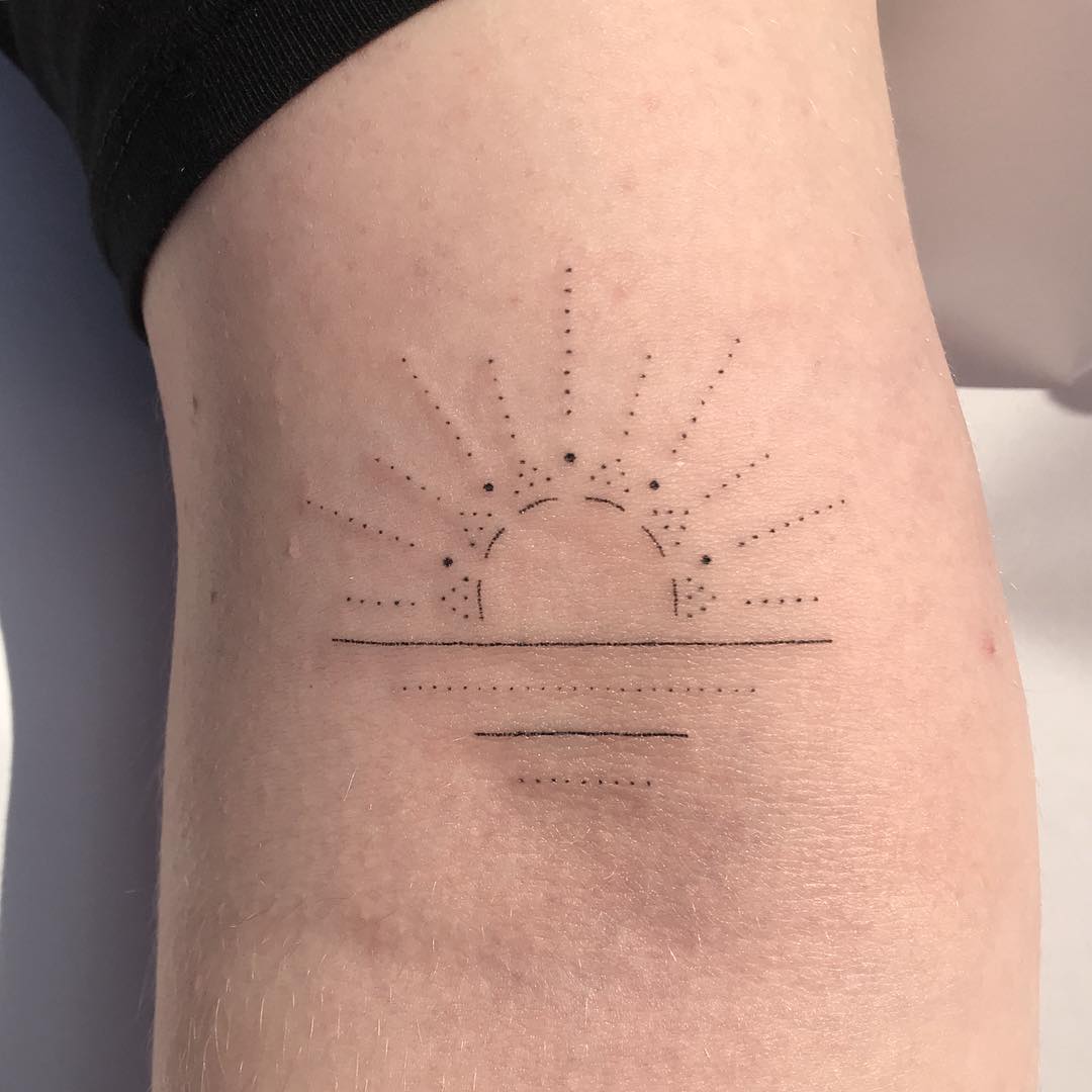 Hand-poked sunset by Femme Fatale Tattoo