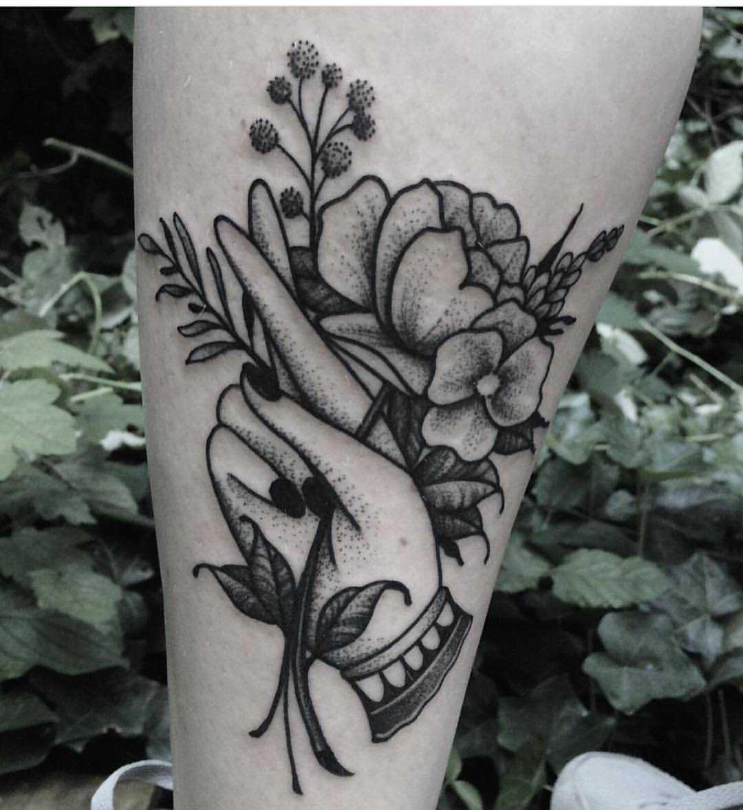 Hand with flower by Roald Vd Broek