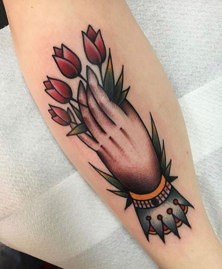 Hand with tulips by Jeroen Van Dijk