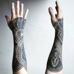 Henna inspired forearm tattoo