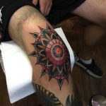 Knee mandala tattoo by Tom Flanagan