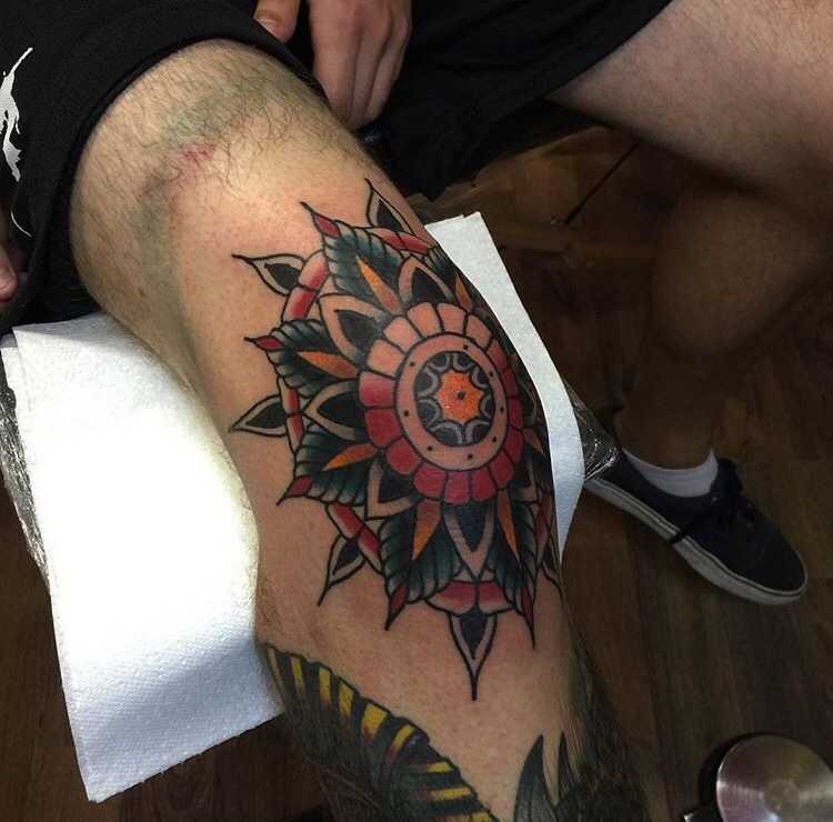 Knee mandala tattoo by Tom Flanagan