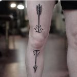 Long arrow tattoo by Jonas Ribeiro