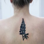 Lupin tattoo on the back