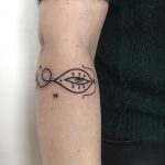 Magic snake tattoo on the arm