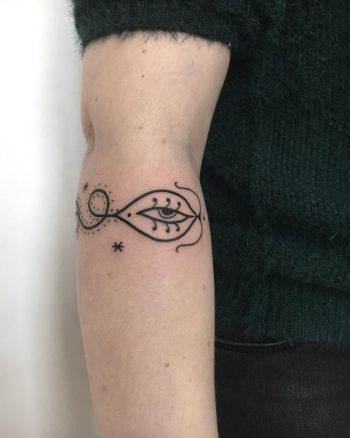 Magic snake tattoo on the arm