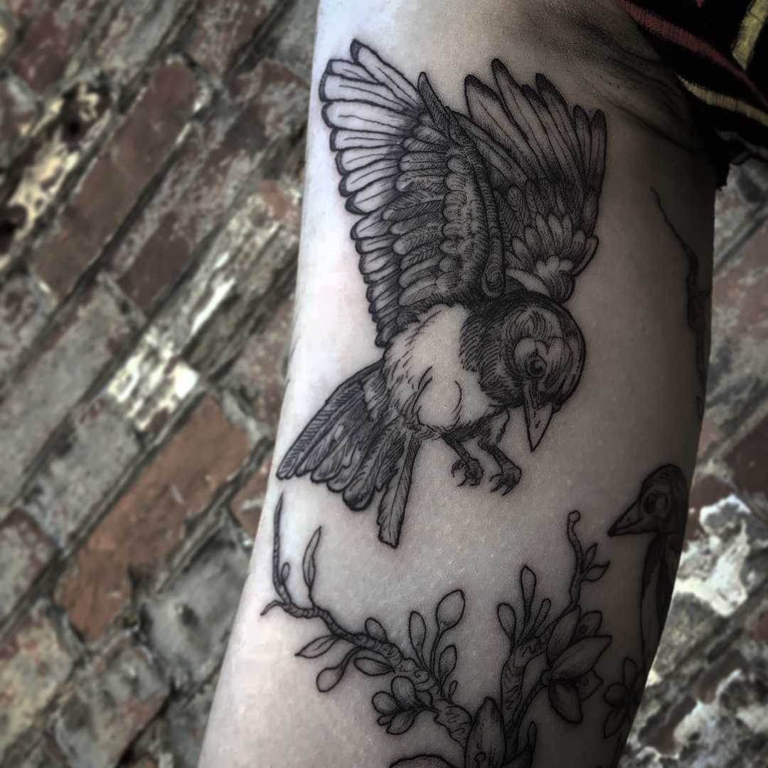 Magpie and cherry blossoms tattoo
