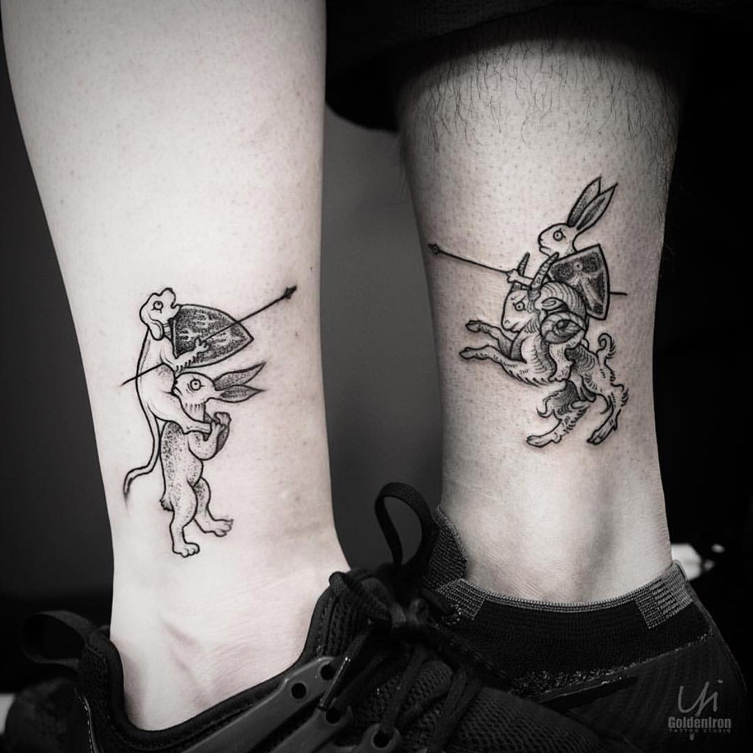 Matching couple tattoo by Yi.postyism