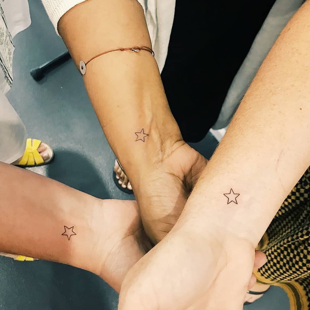 Matching star tattoos by Cholo - Tattoogrid.net