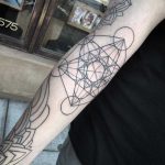 Metatron's cube tattoo on the arm