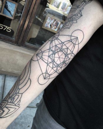 Metatron's cube tattoo on the arm