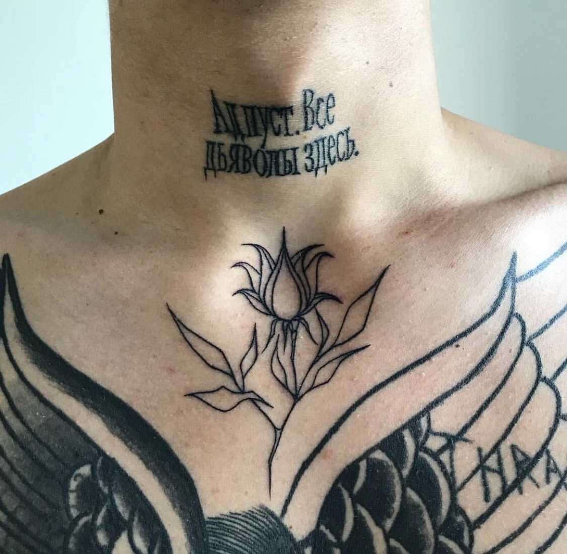 Minimal flower tattoo on chest