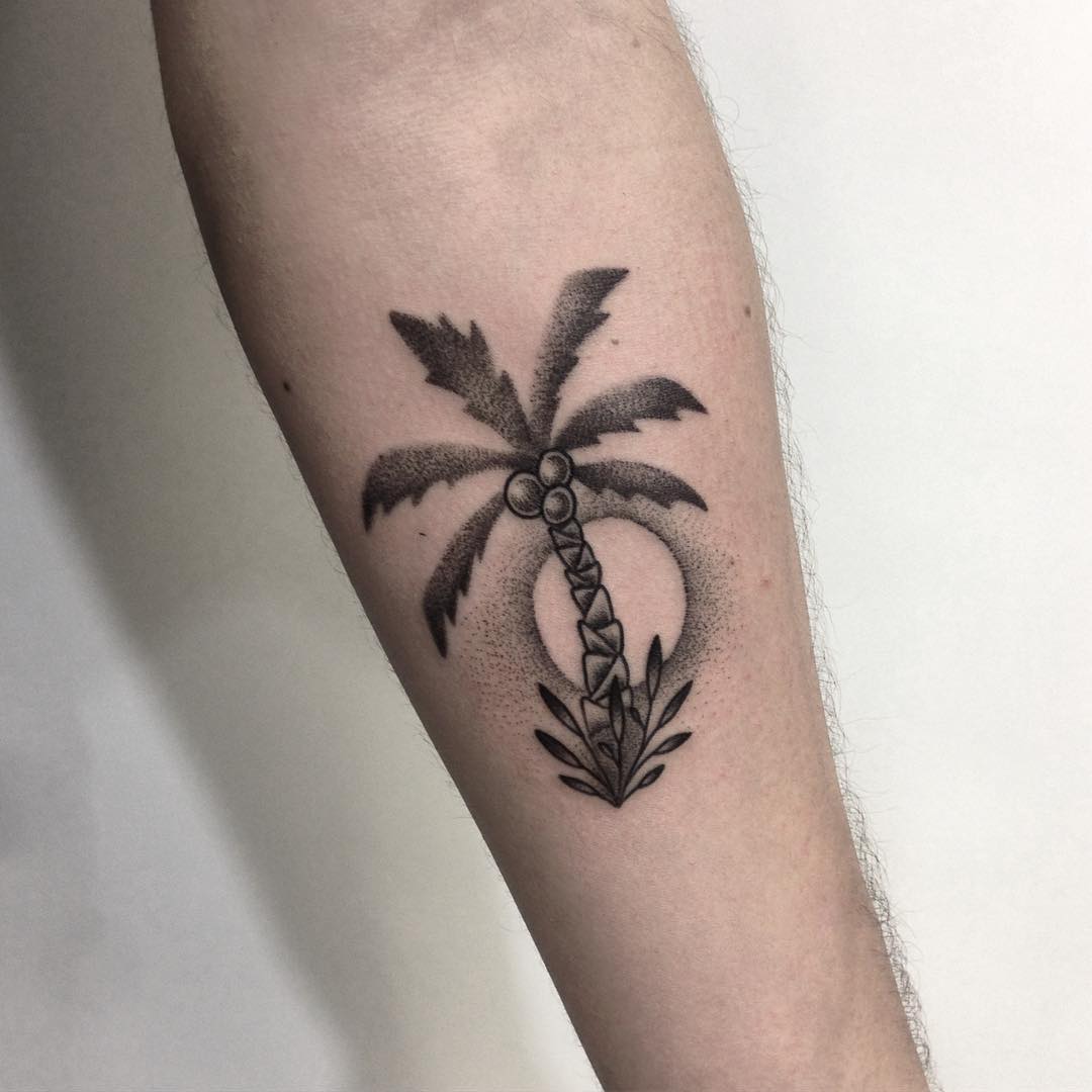 Palm tree and sun tattoo