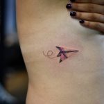 Paper plane tattoo by Drag done at Bang Bang Manhattan