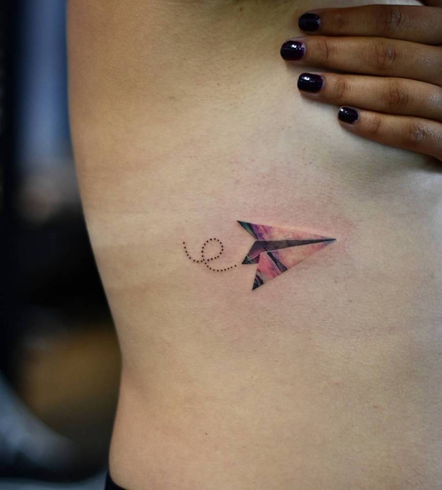 Paper plane tattoo by Drag done at Bang Bang Manhattan