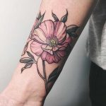 Pink flower tattoo by Catherine Harmony