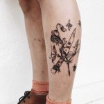 Pocketknife and flowers tattoo