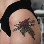 Poppy, fern, lavender, rosemary, and lily tattoo