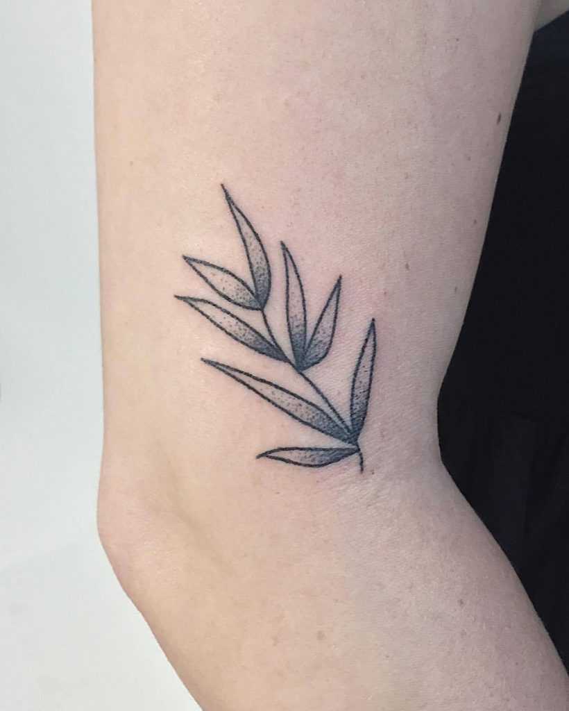 Simple small branch tattoo