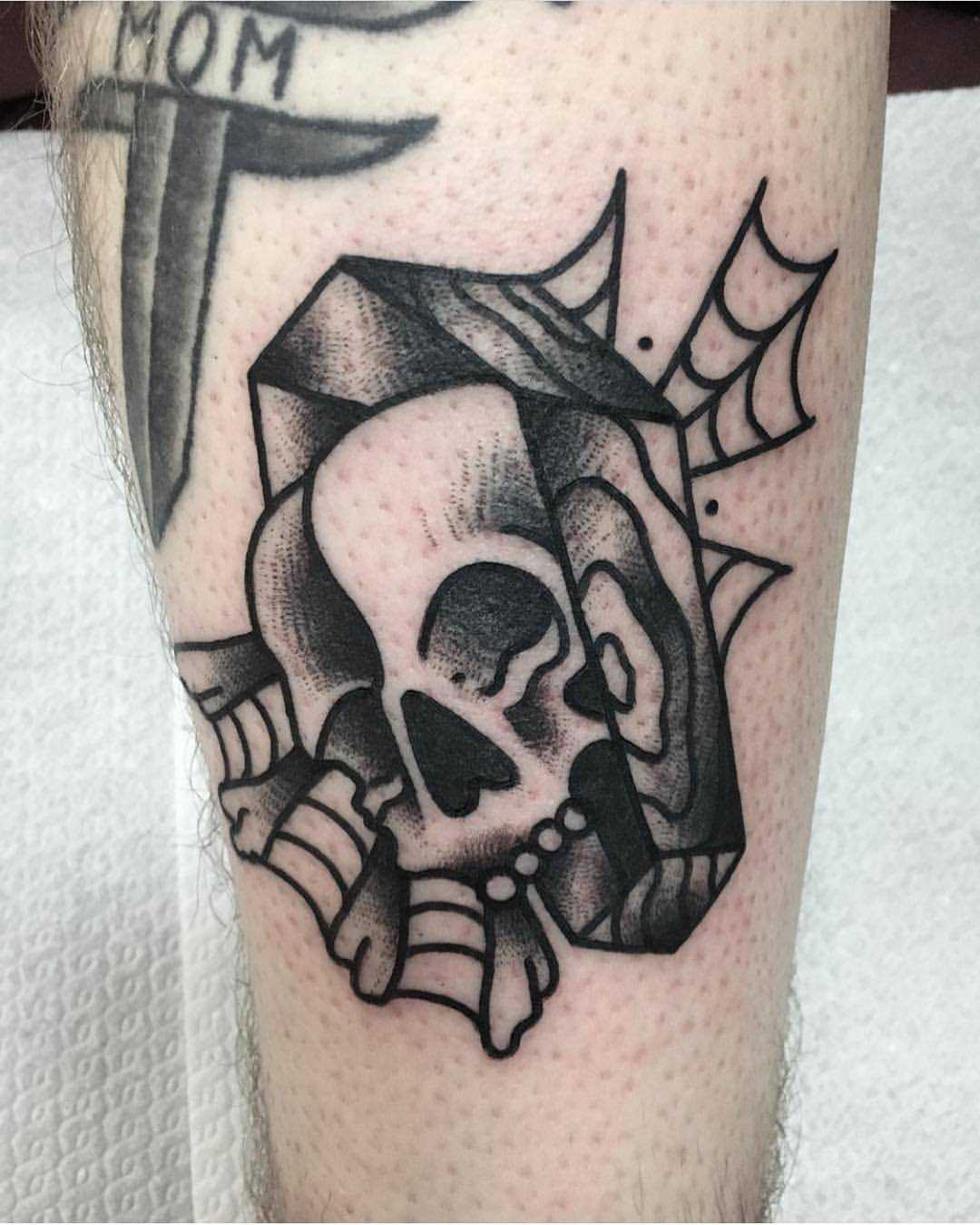 Skull and coffin tattoo by Jeroen Van Dijk