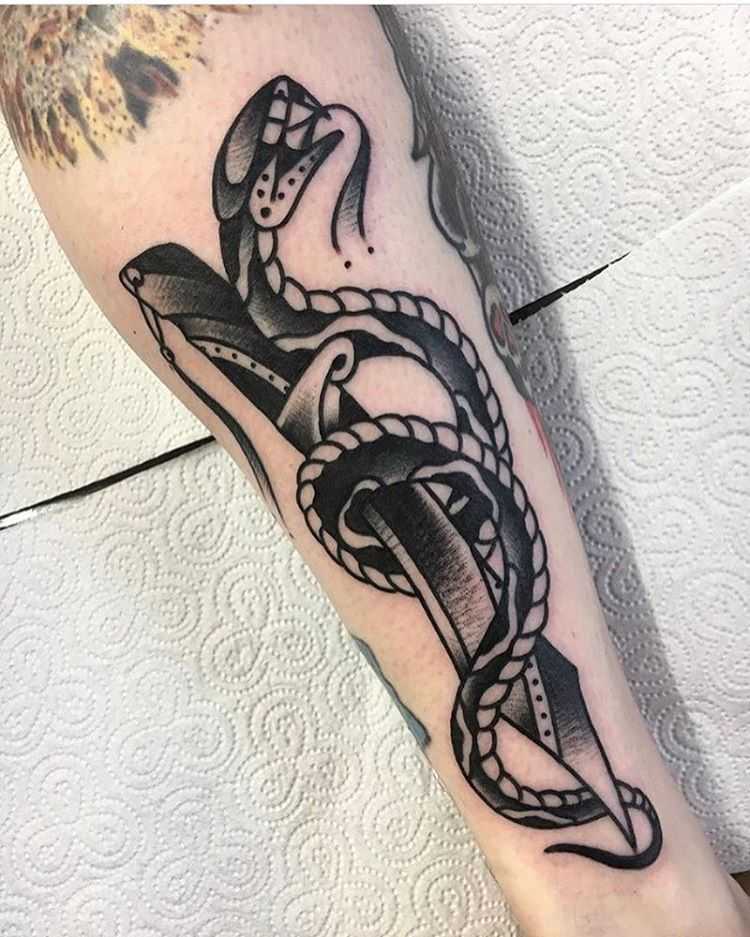 Snake and dagger by Jeroen Van Dijk