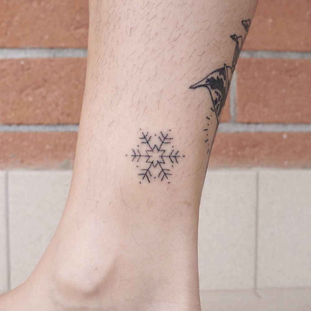 Snowflake tattoo by Beta Pokes