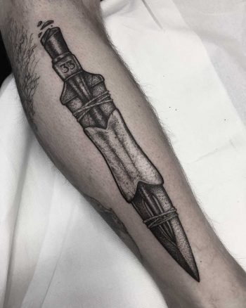 Spear head tattoo