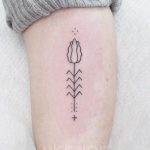 Stylized tulip tattoo by Angie Noir