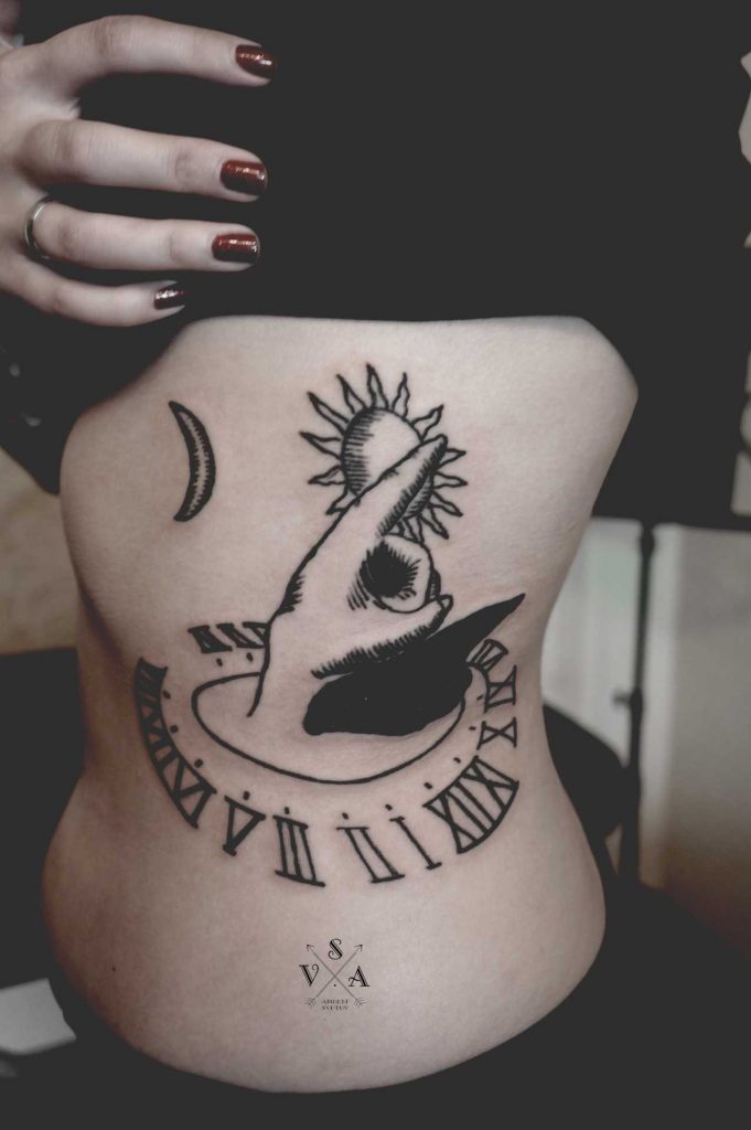 Sundial tattoo by Andrei Svetov