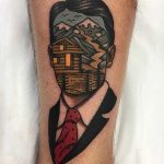 Surrealist man and landscape tattoo by Aaron Ashworth