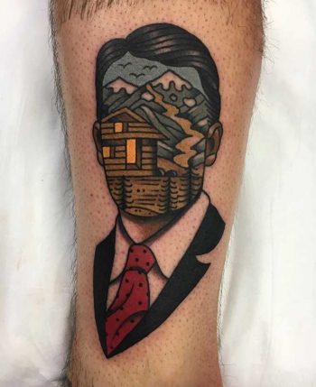 Surrealist man and landscape tattoo by Aaron Ashworth