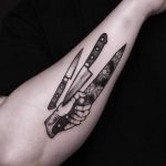 Three knives tattoo