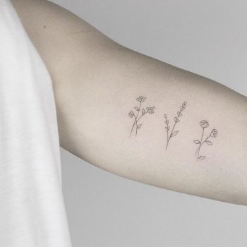 Three tiny flowers by Lindsay April