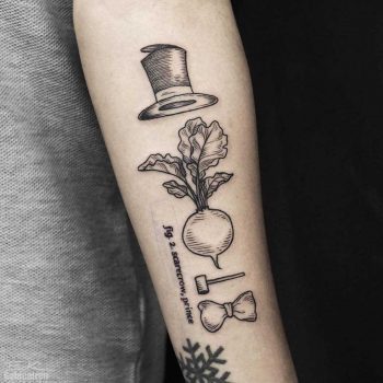 Turnip head tattoo on the forearm