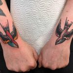Two swallow tattoos by Jeroen Van Dijk