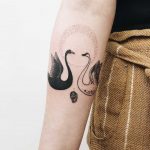 Two swans tattoo