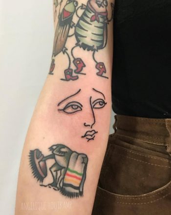 Woman face tattoo by Angelique Houtkamps