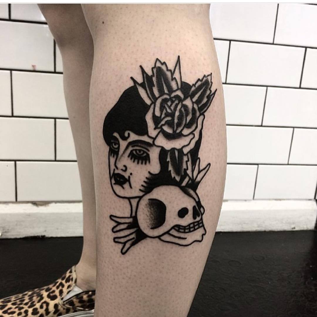 Woman, skull, and rose tattoo by Josh Russell