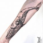 Woodcut whale tattoo by Loïc Lebeuf