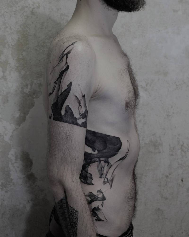 Abstract arm and rib tattoo by Roman Melnikov Plebey