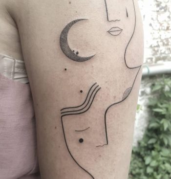 Abstract faces tattoo